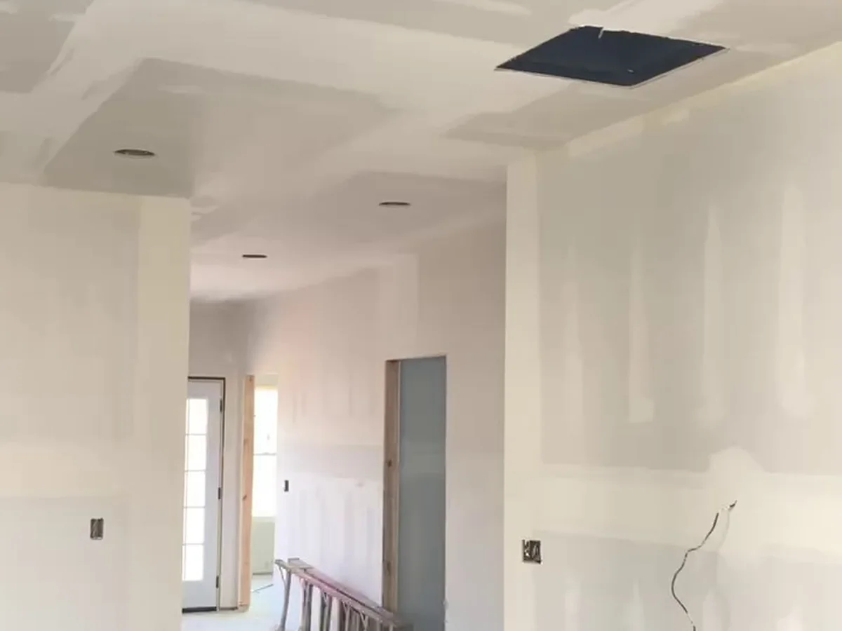 Open living area with drywall taped